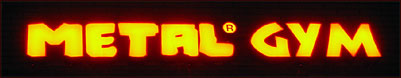 Metal Gym neon logo outside the building